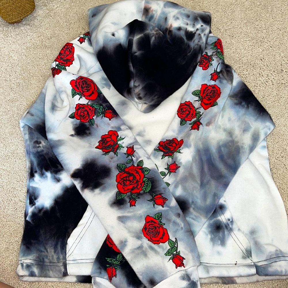 Black and white tie die hoodie with roses on arms